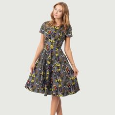 This Mesmerizing 1950s Style Swing Dress Effortlessly Blends Elegance And Playful Vibes To Guarantee A Head-Turning Entrance At Any Event. The Classic Black Hue Serves As The Perfect Canvas For An Enchanting Allover Print Of Vibrant Botanical Butterflies, Creating An Exciting Fusion Of Nature And Style. Designed With A Stylish Boat Neckline And Short Sleeves, This Dress Flatters All Body Shapes While Ensuring Maximum Comfort Throughout The Day Or Night. And Let's Not Forget About The Stunning Ba Fitted Gray Floral Print Dress, Vintage Fitted Gray Dresses, Fitted Vintage Gray Dress, Vintage Dresses Black, Wednesday Addams Dress, Addams Dress, Hostess Dresses, Unique Vintage Dresses, Vintage Black Dress