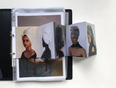 an open book with pictures of women in turbans on it's pages