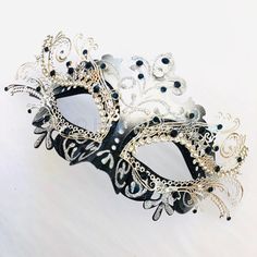 Masquerade mask in silver/black or Gold/Black base studded with rhinestone embellishing. S H I P P I N G - Processed same day or within 24 hours. 1-2 day guaranteed delivery services offered, add items to cart and click on shipping tab for rates. Pls leave a check out note with your need date & contact number (especially for expedited and custom orders) Msg for delivery time frames (Include your state/country). I N C L U D E D Mask comes with matching ribbons S I Z E Adult Size Mask. Detaile Elegant Black Masks For Carnival, Elegant Formal Masquerade Mask For Halloween, Silver Rhinestone Eye Mask For Masquerade, Silver Rhinestone Eye Masquerade Mask, Elegant Silver Masks For Halloween, Elegant Black Masquerade Mask For Mardi Gras, Elegant Black Eye Mask For Masquerade, Elegant Silver Eye Mask, Rhinestone Mask For Masquerade Carnival