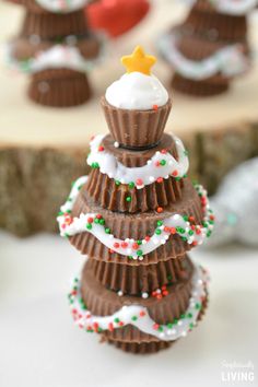 chocolate christmas trees with white frosting and sprinkles