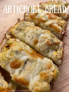 artichoke bread with melted cheese on it and the words artichoke bread