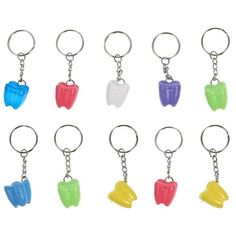 six different colors of plastic fruit shaped keychains with metal hooks on each side