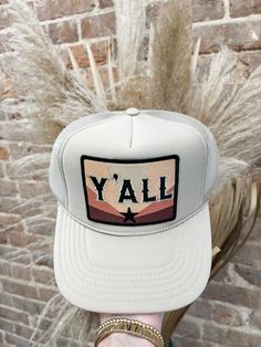 "Be the trendsetter in our Y'all Trucker Hat! This best selling hat is not only trendy and cute, but also features an adjustable clip for the perfect fit. Get ready to rock this hat wherever you go!" Available in 2 colors! Trendy Snapback Hat For Summer Outdoor, Trendy Snapback Hat For Summer, Trendy Summer Snapback Hat For Outdoor, Trendy 5-panel Snapback Hat For Summer, Trendy White Snapback Hat, Trendy White Adjustable Snapback Hat, Trendy Summer 5-panel Snapback Hat, Trendy Summer Trucker Hat For Outdoor, Summer Flat Bill Snapback Hat One Size