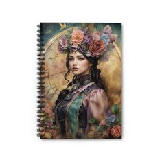 a spiral notebook with a painting of a woman wearing flowers on her head and holding an umbrella