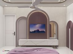 a bedroom with a large flat screen tv mounted to the wall