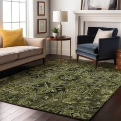 a living room filled with furniture and a rug on top of a hard wood floor