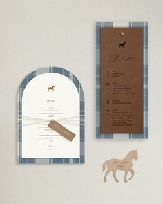 the wedding stationery is laid out on the table next to the paper cutout