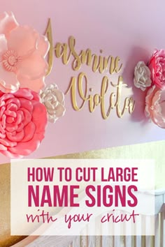 a crib with pink flowers and gold lettering on the wall that says, how to cut large name signs with your crib