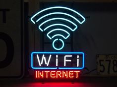 a neon sign that says wifi on it