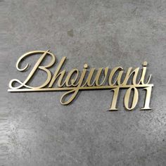 a metal sign that says bhiwaani 101 on the side of a wall