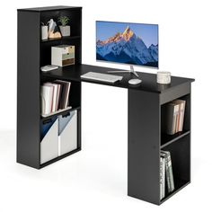 a computer desk with a monitor and bookshelf in front of the screen on it