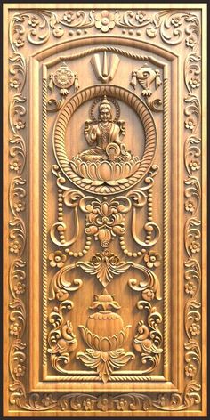 an intricately carved gold wall panel