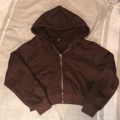 Super Soft, Fleece Zip Up Hoodie, Size Large But Is Very Cropped And Fits More Like A Small. Never Worn, No Pilling. Cheap Brown Tops For College, Cheap Brown Outerwear For Streetwear, Cheap Brown Hoodie With Letter Print, Zip Up Sweater Brown, Trendy Hooded Fleece Jacket, Brown Fleece Hooded Top, Brown Hooded Fleece Top, Brown Zip Up, Brown Fleece Hooded Jacket