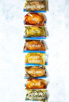 five bags of food sitting on top of each other in front of a white background