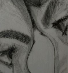 a pencil drawing of two people's eyes