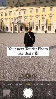 a person standing in front of a building with a sign that says your next tourist photo like that?