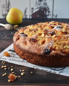 a cake sitting on top of a wooden table