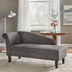 a living room scene with focus on the chaise