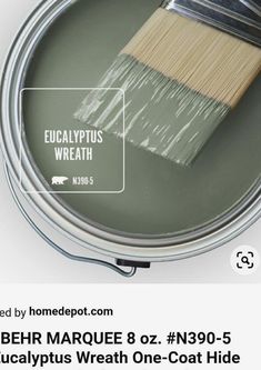 a paint can with a brush in it and the words behr marquee 8oz n380 - 5