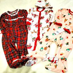 Great Condition- Toddler Holiday Pajamas 3 Different Items....Pottery Barn Santa Feetie Pajamas With Snaps And Adorable Matching Hat, Red Plaid Feetie Pajamas With Snaps And White Eyelet Lace And Brand New With Tags Carters Holiday Feetie Pajamas- Pink With Santa, Penguins And Reindeer On Them. All Super Soft And Cozy.....Pottery Barn 6-12 Months Carters And Red Plaid Pjs - 9 Months Family Matching Red Sleep Sets, Family Matching Sleep Sets In Red, Red Family Matching Bedtime Sets, Red Family Matching Sets For Home, Red Family Matching Home Sets, Red Family Matching Sleepwear For Sleepover, Playful Red Sleep Sets, Playful Red Sleepwear Sets, Red Playful Sleepwear Sets