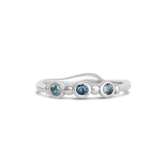 Wear them on their own or stacked all the way up your finger, our gemstone stacking bands in reclaimed sterling silver are the perfect addition to your daily jewels, a perfect gift for a loved one or yourself. Available in Ruby, Rhodolite Garnet, London Blue Topaz, Peridot, Amethyst, Blue Zircon, Spessartite Garnet, and Moonstone or mixed (pick your own, message us for your selection) Each Stone measures approx 2.5mm. These beautiful pieces are handmade to order in Emily's Hudson Valley studio. Unique White Gold Jewelry With Si Clarity, Sterling Silver Midi Rings With Birthstone For Anniversary, Sterling Silver Birthstone Midi Rings For Anniversary, Silver Stackable Gemstones As A Gift, Adjustable Stackable Promise Rings With Bezel Setting, Fusion Style Stackable Round Jewelry, Sapphire Gemstone Stackable Rings With Round Band, Sapphire Gemstone Stackable Rings, Silver Three Stone Round Jewelry