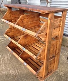 a wooden table with several drawers on it