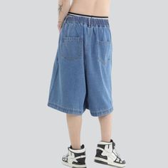 Take your look to the next level this summer with our retro baggy men's denim shorts from the 2023 Collection. Combining the timeless trend of denim with the couture trend of y2k fashion. these shorts will become your go-to piece for any occasion. Featuring a medium-rise fit. zipper and button closures. and a variety of colors. these shorts are the perfect blend of comfort and vibe.Distinctive Features: Y2K Style: Inspired by the latest Y2k trendy trends. these shorts are a stylish vogue stateme Baggy Jean Shorts For Summer Streetwear, Y2k Style Jean Shorts For Summer Streetwear, Baggy Blue Jean Shorts For Streetwear, Cotton Jean Shorts For Summer Streetwear, Jean Shorts For Streetwear In Summer, Blue Baggy Jean Shorts For Streetwear, Summer Streetwear Medium Wash Jeans, Medium Wash Jeans For Summer Streetwear, Y2k Baggy Summer Shorts