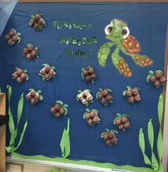 a bulletin board with sea animals and turtles on it