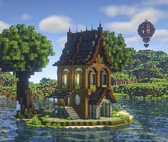 a small house on an island in the middle of water with hot air balloons flying over it