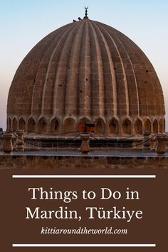 an old building with the words things to do in mardin, turkiye