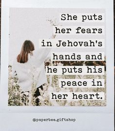 a woman standing in a field with her arms spread out and the words she puts her ears in jehovan's hands and he puts his peace in her heart