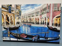 a painting of two gondolas on the side of a building