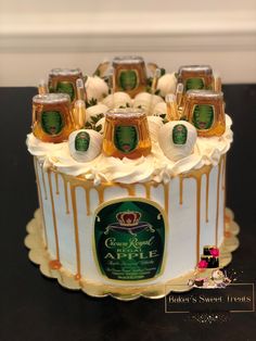 there is a cake that has been decorated with beer