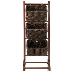 a wooden shelf with three baskets on top and two shelves below it, against a white background