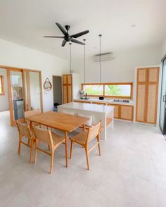 a large open kitchen and dining room area