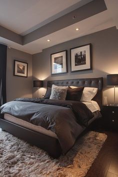 a large bed sitting in the middle of a bedroom next to two framed pictures on the wall