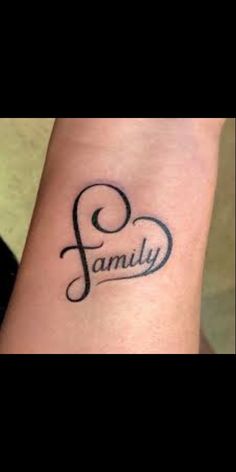 a tattoo with the word family on it