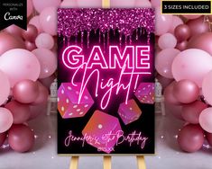 a game night sign surrounded by balloons and streamers