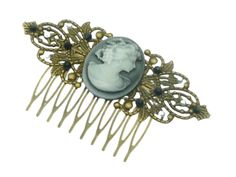 Large unique hair comb, ideal for historical events, for bridal hair accessories and more. The hair comb is made of bronze-colored metal. In the middle there is a rare cameo with a lady and grapes in anthracite. On the sides of the hair comb there are beautiful leaf tendrils, decorated with high-quality rhinestones in black and white half pearls. The hair comb measures 5.2 L x 9.7 W cm. Rococo Hair, Unique Hair, Unique Hairstyles, Style Hair, Historical Events, Bridal Hair Accessories, Bronze Color, Wedding Hair Accessories, Hair Updos