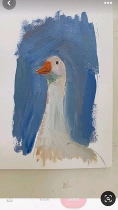 a drawing of a duck in blue and white with an orange beak on it's head