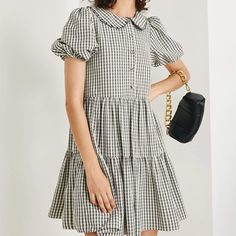 Feel classic in this 60s mini dress that was made for summertime picnics. Available in green, blue, and grey plaid, pair with sandals or white sneakers! No Stretch Medium Weight Regular Fit Fabric: 70% Polyester, 30% Cotton, Lining: 100% Polyester. Model is 177cm/5'9" tall, 79cm/31" bust, 58cm/23" waist and 88cm/35" hip and wearsa size S Care Instruction: Hand Wash, Do not bleach, Line dry in shade, Iron cool (max 110℃), Dry clean, tetrachloroethylene(PCE) only. Preppy Mini-length Spring Dress, Preppy Mini Length Spring Dress, Preppy Plaid Short Sleeve Dress, Preppy Mini Length Dress For Spring, Spring Preppy Short Sleeve Plaid Dress, Preppy Short Sleeve Plaid Dress For Spring, Spring Preppy Knee-length Dress, Casual Summer Mini Dress For Picnic, Gingham Plaid Short Sleeve Dress For Summer