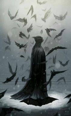 a man standing in the snow surrounded by bats