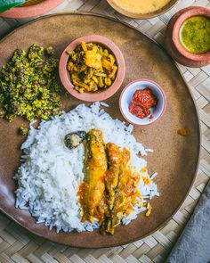 the meal is prepared and ready to be eaten on the table with other dishes around it