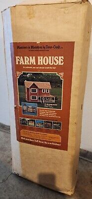 an old farm house box sitting on the ground