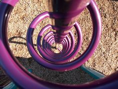 an overhead view of purple rings on the ground