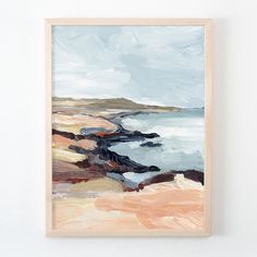 a painting hanging on the wall next to a white wall with a blue ocean in it