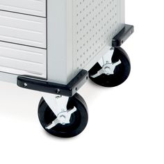 a white and black cart with drawers on it's wheels, against a white background