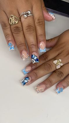 #shortnailsdesign #kaws #blueaesthetic #differentshadesofblue #goldjewellerycollection #rhinestone #naildesign Colored Acrylic Nails Blue, Blue Acrylic Nails Ideas Square, Nail Ideas For College, Light Blue Kaws Nails, Shades Of Blue Acrylic Nails, Baddie Blue Nails Short, Blue Cute Acrylic Nails, Back To School Nails With Charms, Nail Inspo First Day Of School