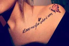 a woman with a tattoo on her shoulder saying love me for who i am