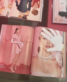 an open book with pictures of women in dresses and accessories